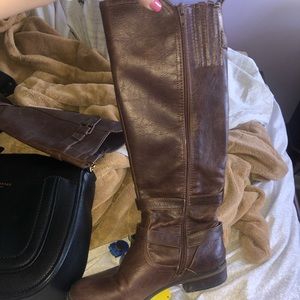 Tall brown riding boots